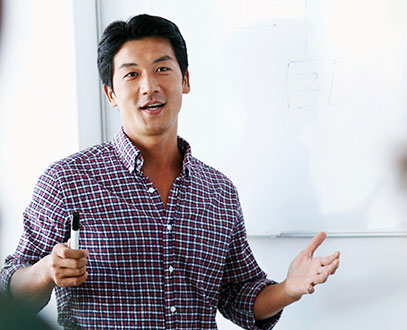 CEO of the company, Craig, sitting in a business suit, looking attentive to customer's needs